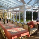 Lovely seating for large groups in dining conservatory
