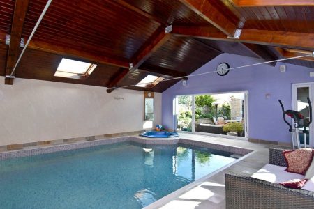 9m by 6m Indoor heated pool and jacuzzi plus folding glass doors onto patio